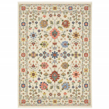 8' X 11' Ivory Salmon Pink Gold Blues Grey Rust And Green Oriental Power Loom Stain Resistant Area Rug With Fringe