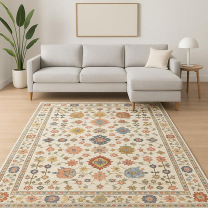10' X 13' Ivory Salmon Pink Gold Blues Grey Rust And Green Oriental Power Loom Stain Resistant Area Rug With Fringe
