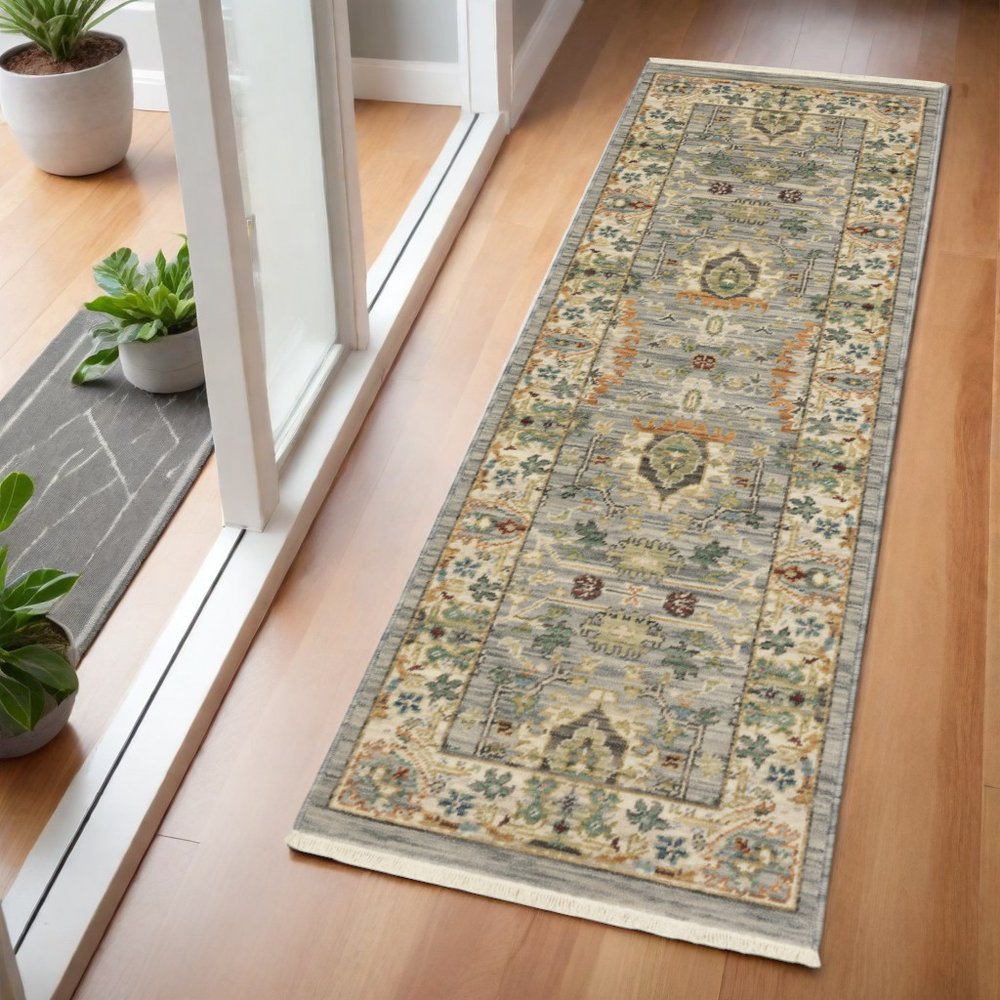 2' X 6' Grey Ivory Orange Teal Green Charcoal Blue And Red Oriental Power Loom Stain Resistant Runner Rug With Fringe
