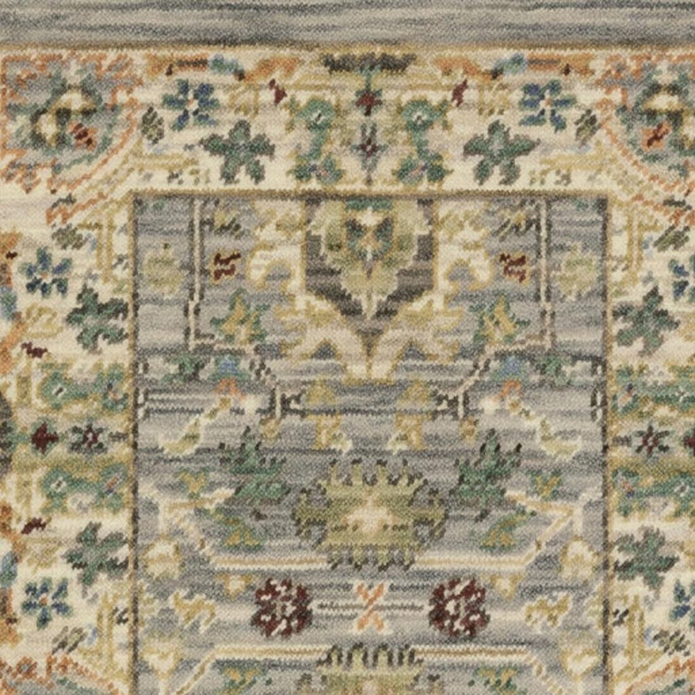 2' X 6' Grey Ivory Orange Teal Green Charcoal Blue And Red Oriental Power Loom Stain Resistant Runner Rug With Fringe