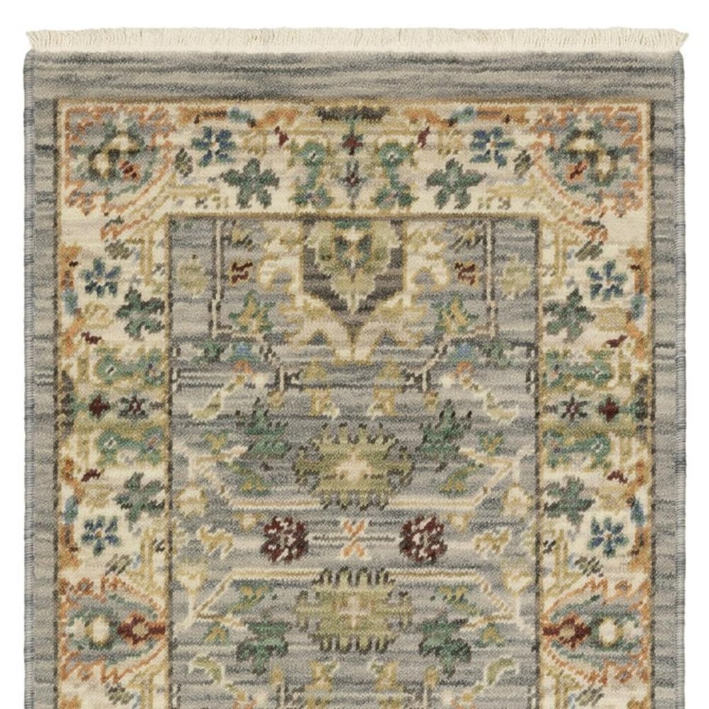 2' X 6' Grey Ivory Orange Teal Green Charcoal Blue And Red Oriental Power Loom Stain Resistant Runner Rug With Fringe