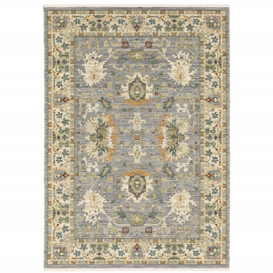 5' X 8' Blue And Ivory Oriental Power Loom Stain Resistant Area Rug With Fringe