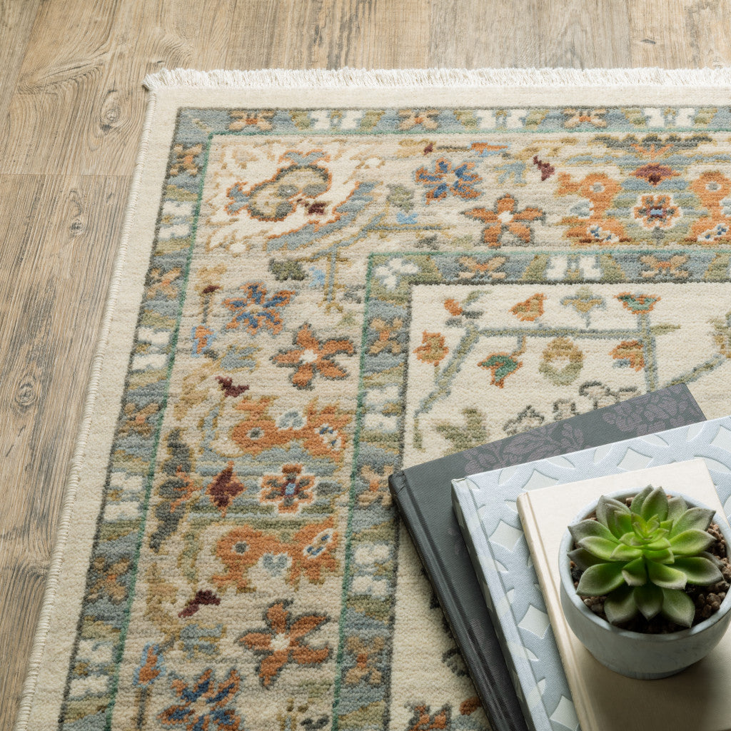 2' X 6' Ivory Grey Orange Green Blue And Red Oriental Power Loom Stain Resistant Runner Rug With Fringe