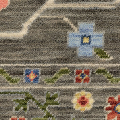 6' X 9' Grey Blue Pink Orange Rust Red Green And Ivory Oriental Power Loom Stain Resistant Area Rug With Fringe