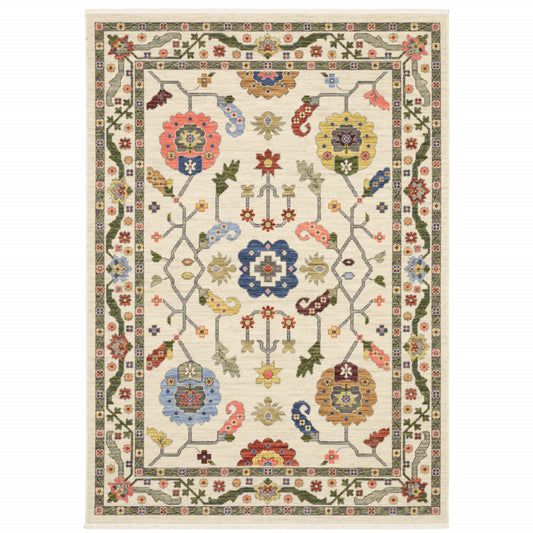 2' X 3' Ivory Green Blues Pink Yellow Rust Brown Tan And Grey Oriental Power Loom Stain Resistant Area Rug With Fringe