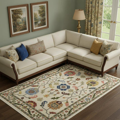 8' X 11' Ivory Green Blues Pink Yellow Rust Brown Tan And Grey Oriental Power Loom Stain Resistant Area Rug With Fringe