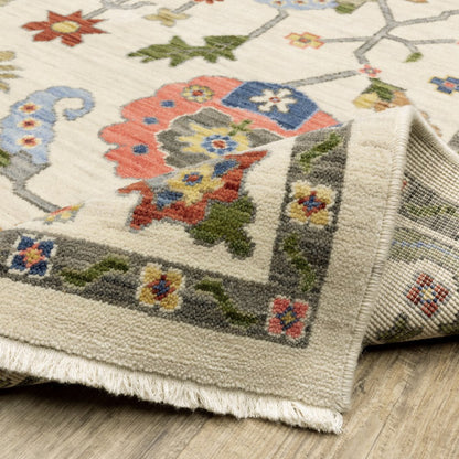 8' X 11' Ivory Green Blues Pink Yellow Rust Brown Tan And Grey Oriental Power Loom Stain Resistant Area Rug With Fringe