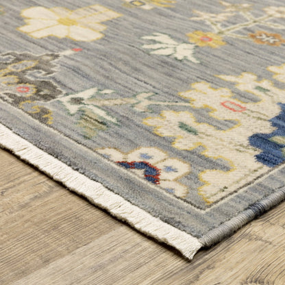 7' X 10' Gray Ivory And Blue Oriental Area Rug With Fringe