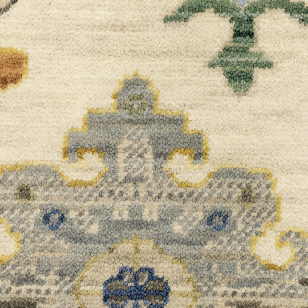 2' X 6' ivory beige gold grey blue pink red rust and green oriental power loom stain resistant runner rug with fringe