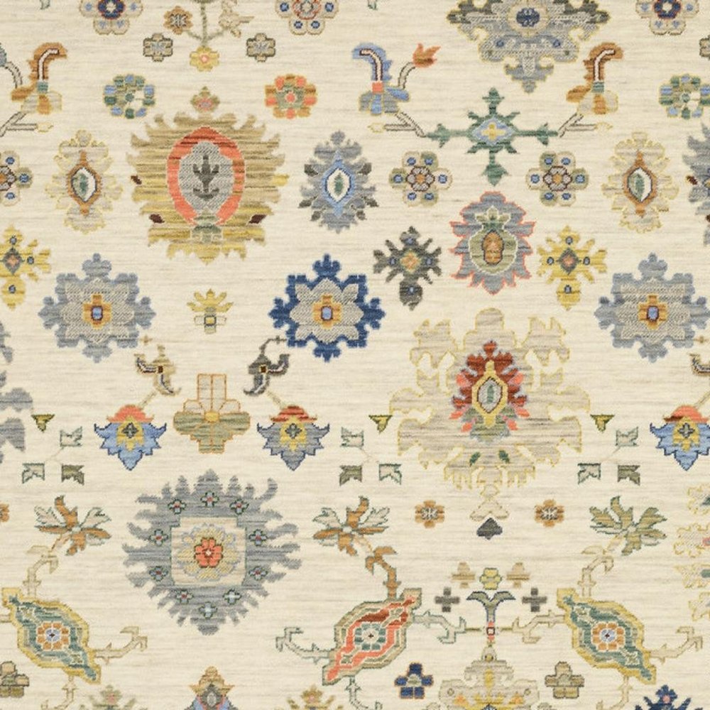 2' X 6' Ivory Beige Gold Grey Blue Pink Red Rust And Green Oriental Power Loom Stain Resistant Runner Rug With Fringe