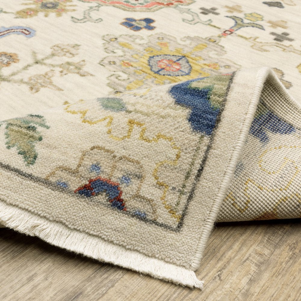5' X 8' Ivory Beige And Blue Oriental Area Rug With Fringe