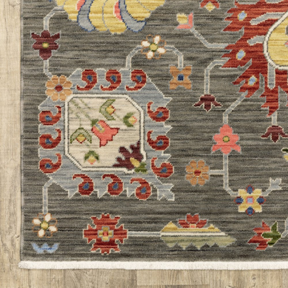 5' X 8' Gray Ivory And Red Oriental Area Rug With Fringe