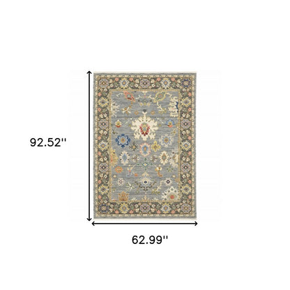 5' X 8' Blue Ivory And Red Oriental Area Rug With Fringe