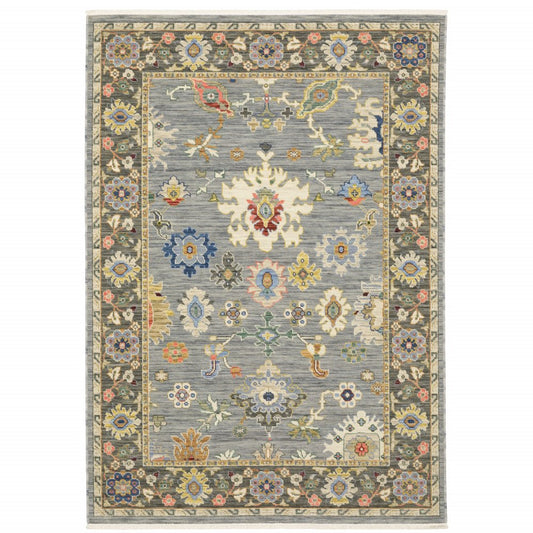 5' X 8' Blue Ivory And Red Oriental Area Rug With Fringe