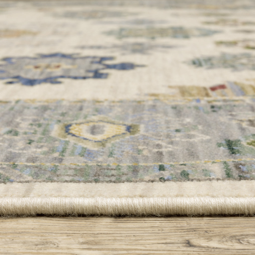 3' X 5' Ivory Blue Grey Teal Gold Green And Rust Oriental Power Loom Stain Resistant Area Rug With Fringe