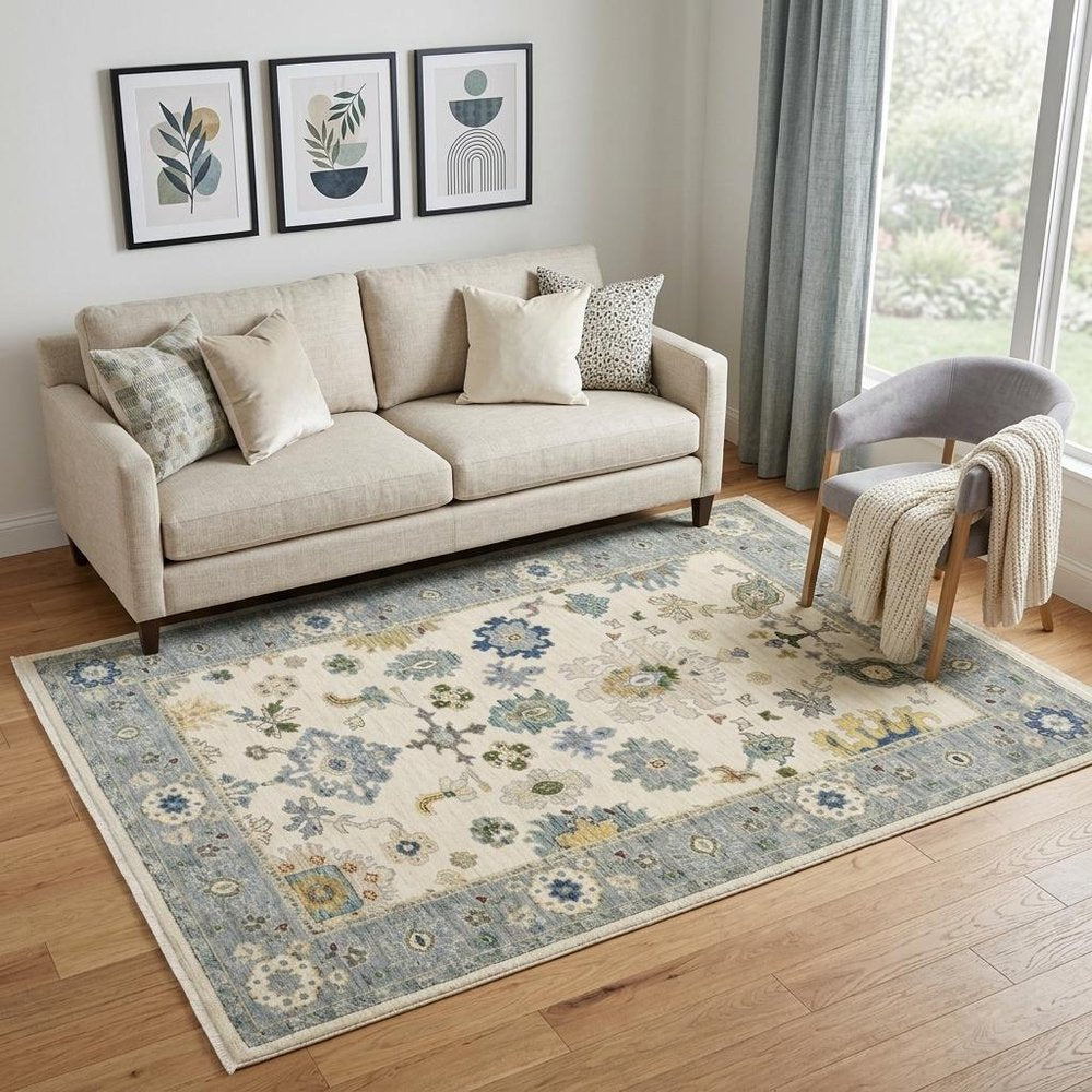 5' X 8' Ivory And Blue Oriental Area Rug With Fringe