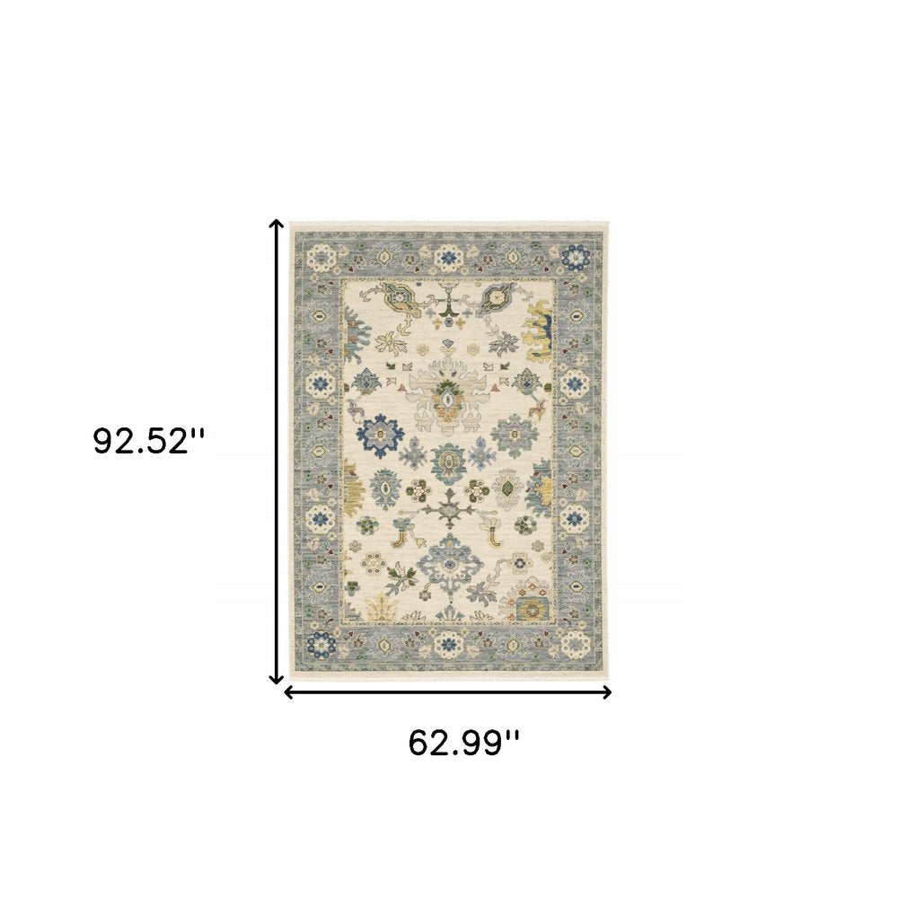 5' X 8' Ivory And Blue Oriental Area Rug With Fringe