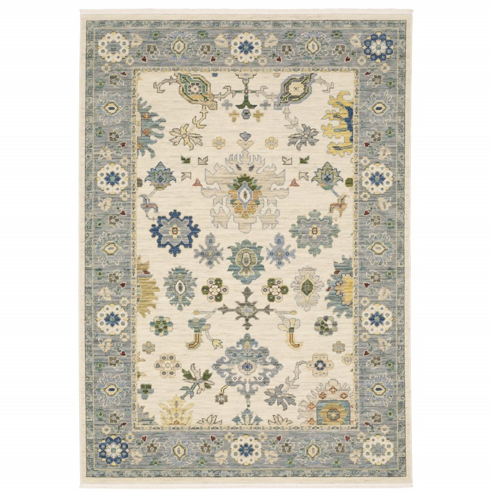 5' X 8' Ivory And Blue Oriental Area Rug With Fringe