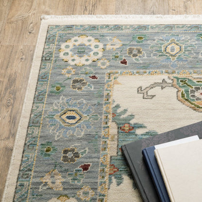 5' X 8' Ivory And Blue Oriental Area Rug With Fringe