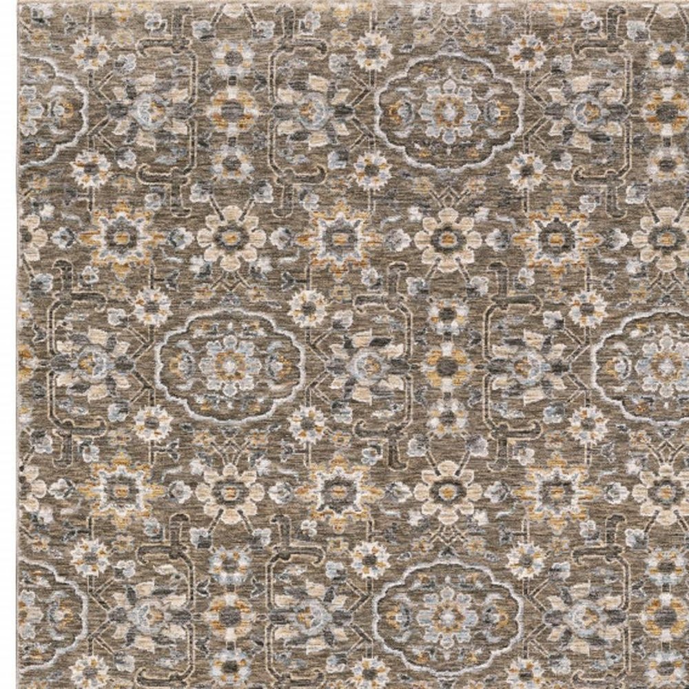 5' X 8' Grey And Tan Floral Power Loom Stain Resistant Area Rug With Fringe