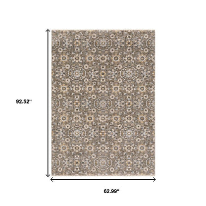 5' X 8' Grey And Tan Floral Power Loom Stain Resistant Area Rug With Fringe