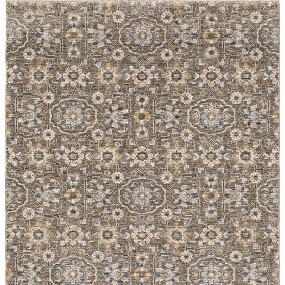 5' X 8' Grey And Tan Floral Power Loom Stain Resistant Area Rug With Fringe