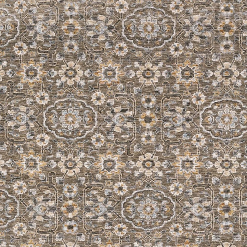 5' X 8' Grey And Tan Floral Power Loom Stain Resistant Area Rug With Fringe