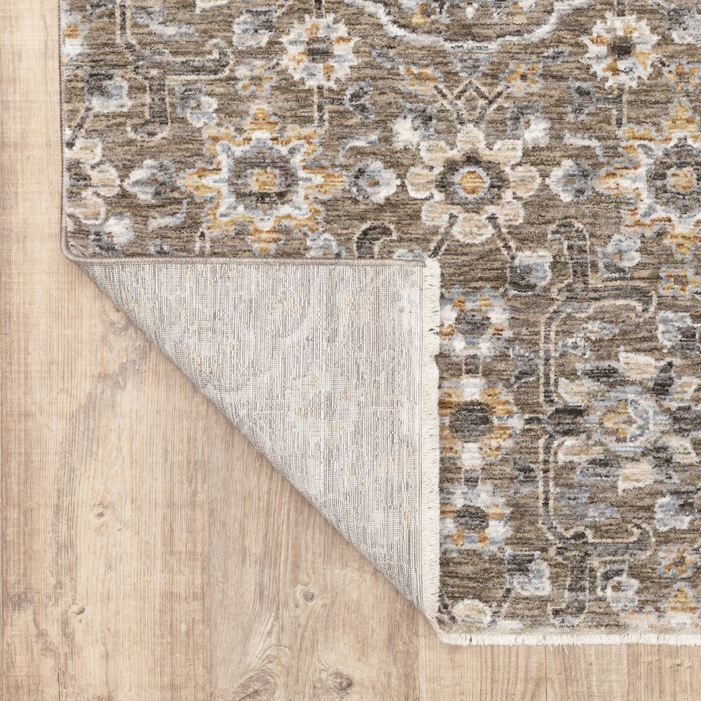 8' X 11' Gray Floral Power Loom Area Rug With Fringe