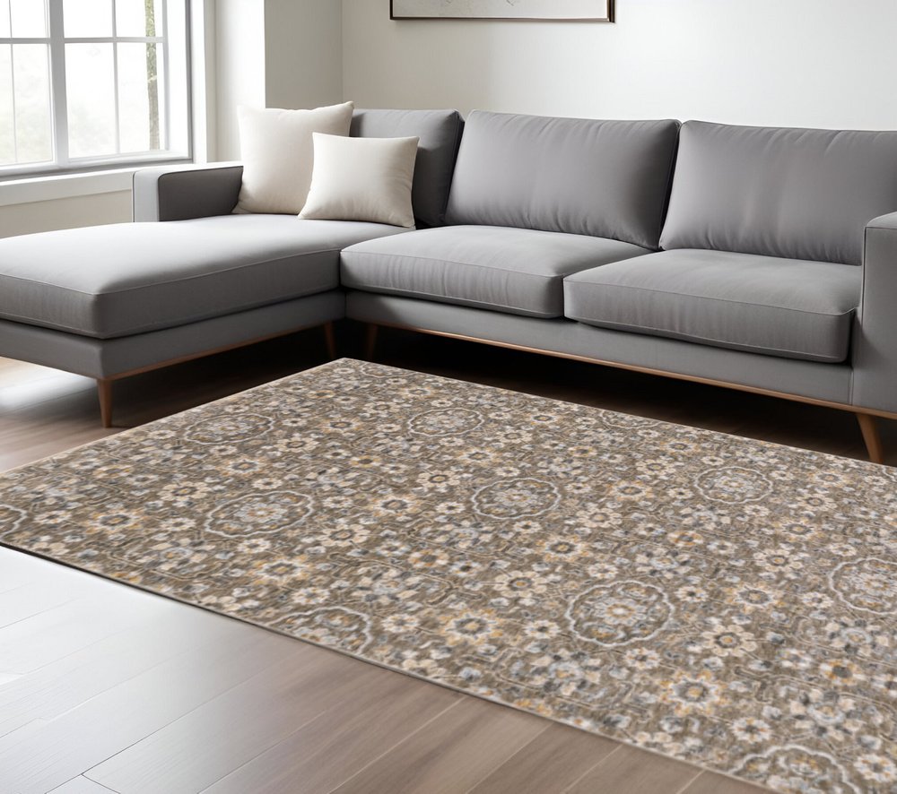 10' X 13' Grey And Tan Floral Power Loom Stain Resistant Area Rug With Fringe