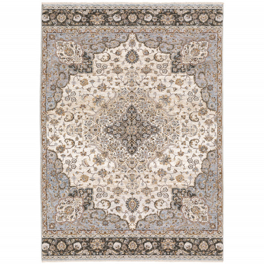 6' X 9' Ivory And Blue Oriental Power Loom Stain Resistant Area Rug With Fringe