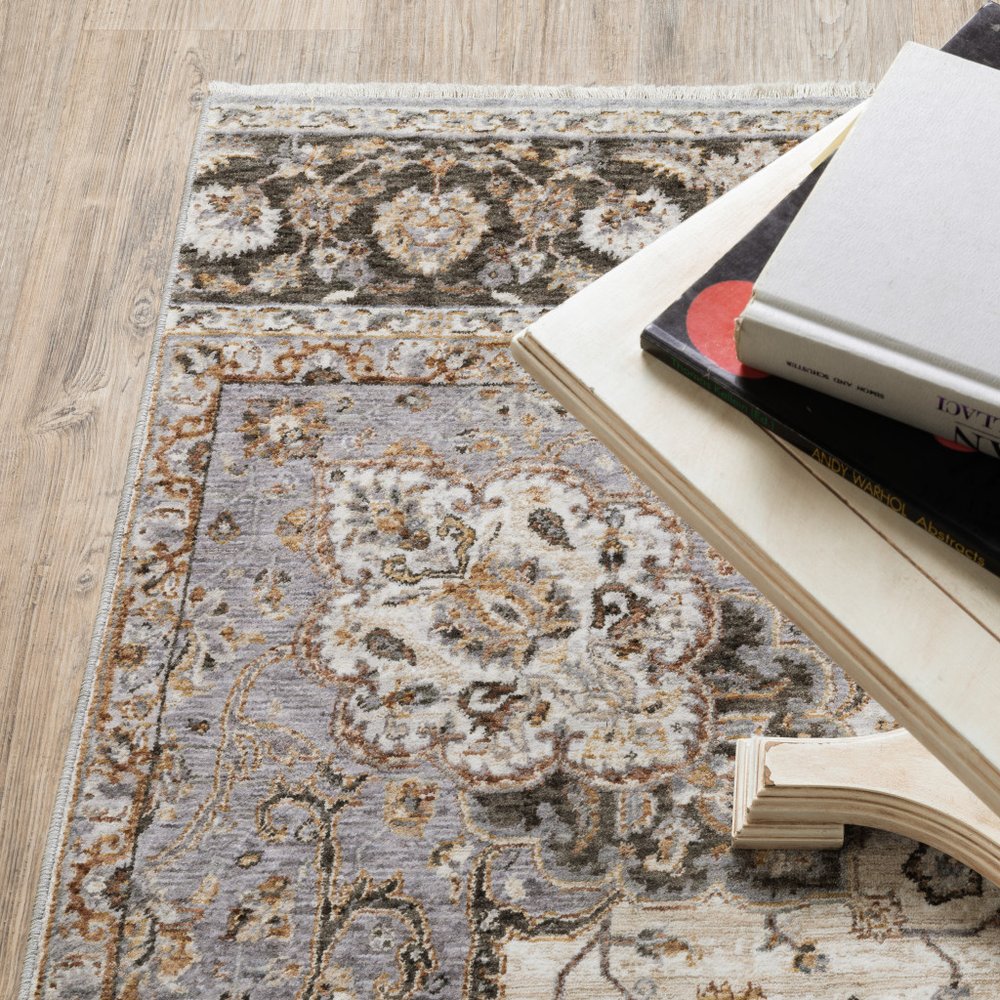 7' X 10' Ivory And Blue Oriental Area Rug With Fringe