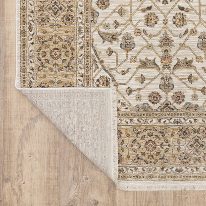 3' X 5' Ivory And Gold Oriental Power Loom Stain Resistant Area Rug With Fringe