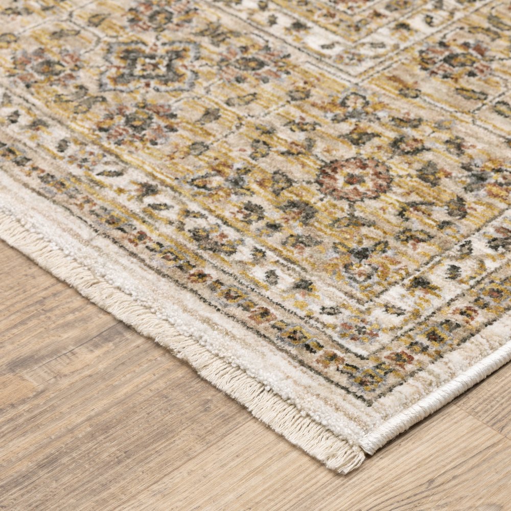 5' X 8' Ivory And Gold Oriental Power Loom Stain Resistant Area Rug With Fringe