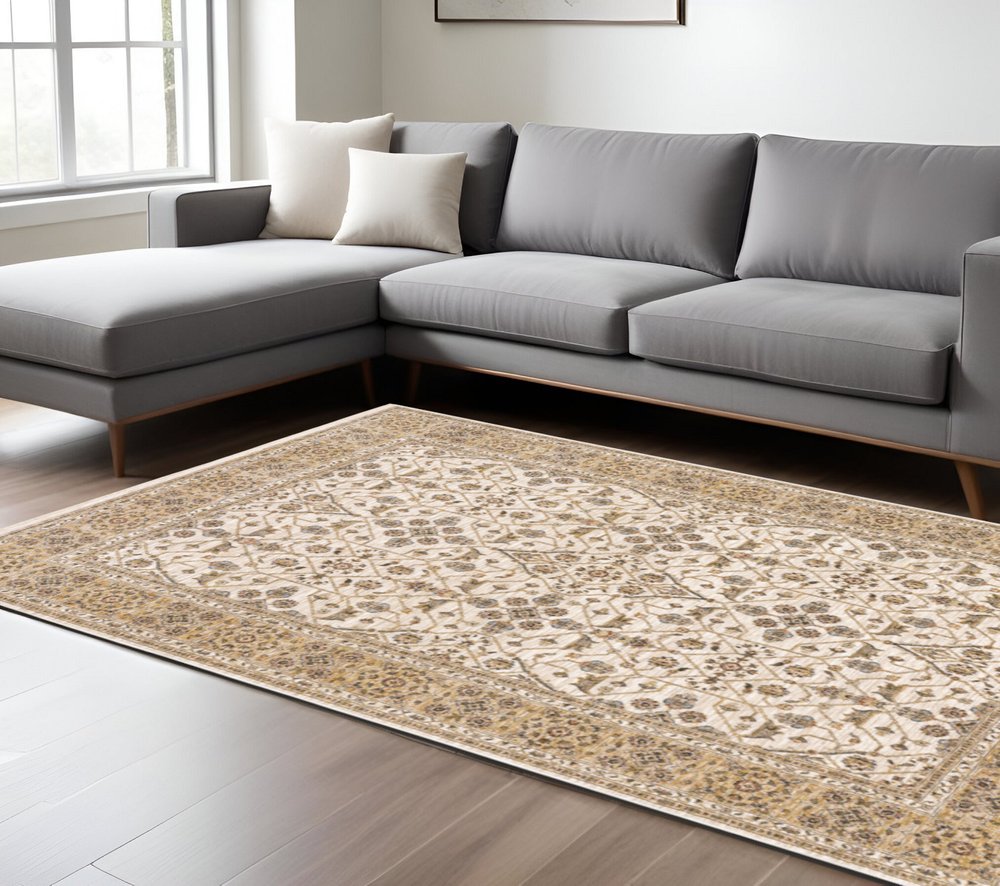 7' X 10' Ivory And Gold Oriental Area Rug With Fringe