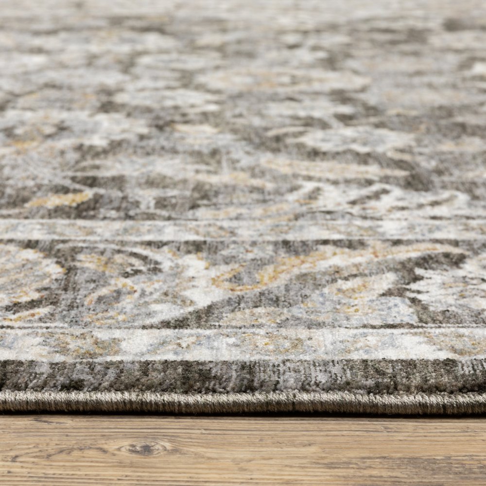 2' X 3' Grey And Ivory Oriental Power Loom Stain Resistant Area Rug With Fringe