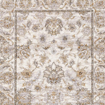 2' X 8' Ivory And Grey Oriental Power Loom Stain Resistant Runner Rug With Fringe