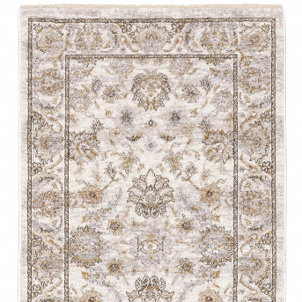 2' X 8' Ivory And Grey Oriental Power Loom Stain Resistant Runner Rug With Fringe