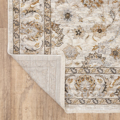 5' X 8' Ivory And Grey Oriental Power Loom Stain Resistant Area Rug With Fringe