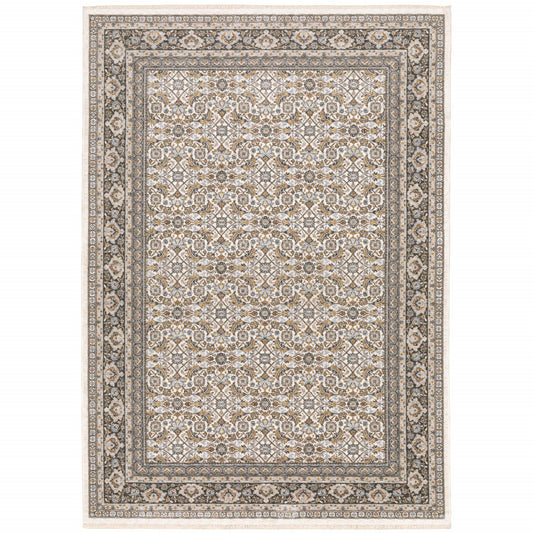 6' X 9' Ivory And Grey Oriental Power Loom Stain Resistant Area Rug With Fringe