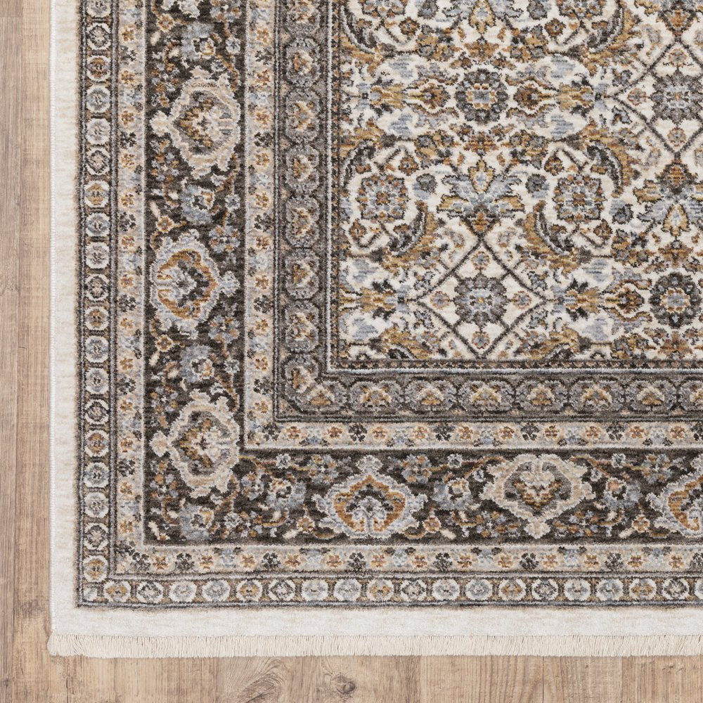 7' X 10' Ivory And Charcoal Oriental Area Rug With Fringe
