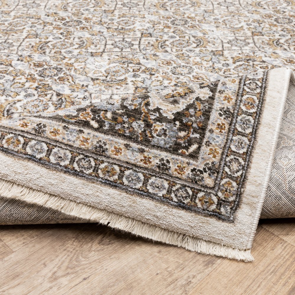 7' X 10' Ivory And Charcoal Oriental Area Rug With Fringe