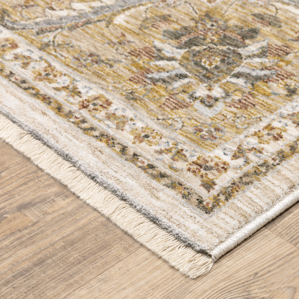 6' X 9' Ivory And Gold Oriental Power Loom Stain Resistant Area Rug With Fringe