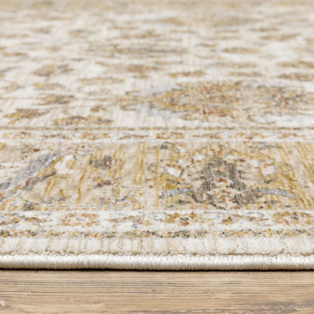 7' X 10' Ivory And Gold Oriental Area Rug With Fringe