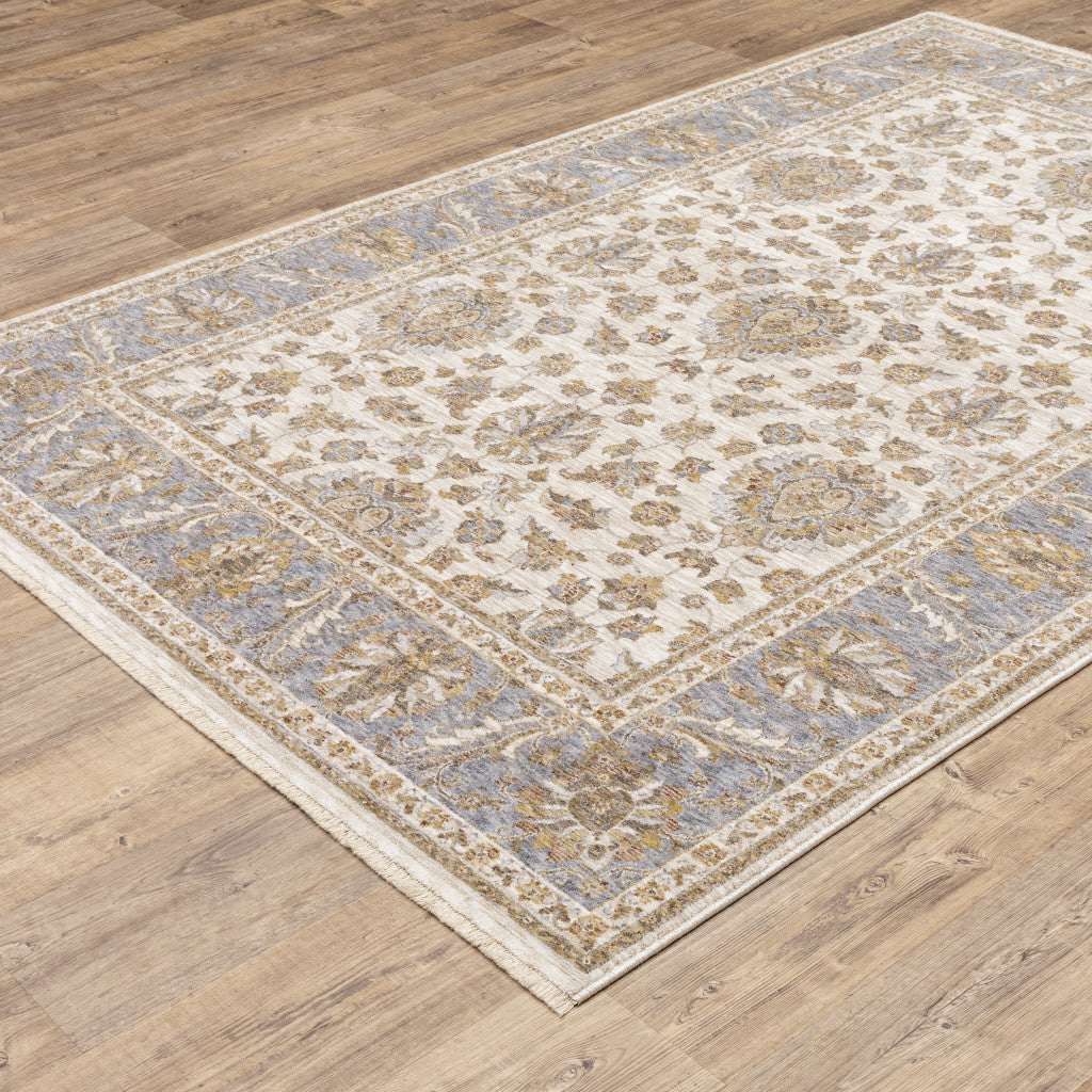 2' X 3' Ivory And Blue Oriental Power Loom Stain Resistant Area Rug With Fringe