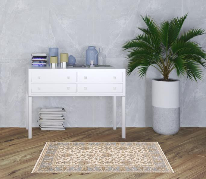 3' X 5' Ivory And Blue Oriental Power Loom Stain Resistant Area Rug With Fringe