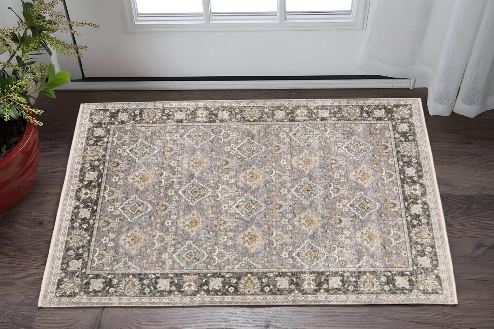 2' X 3' Grey And Blue Oriental Power Loom Stain Resistant Area Rug With Fringe