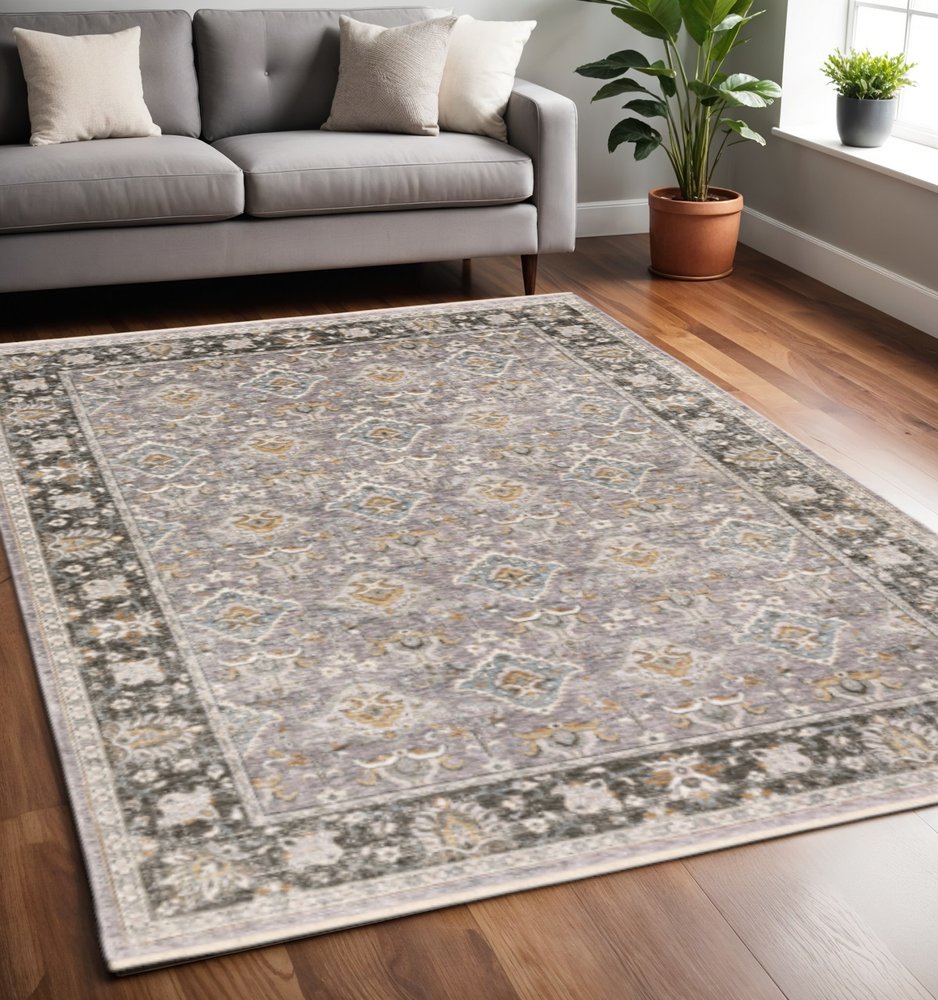 5' X 8' Grey And Blue Oriental Power Loom Stain Resistant Area Rug With Fringe