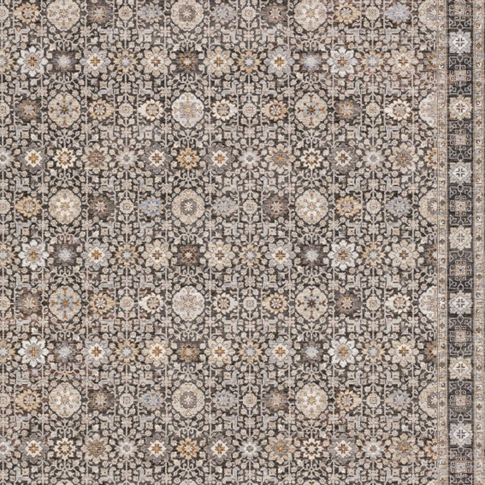 8' X 11' Charcoal Ivory and Beige Floral Power Loom Area Rug With Fringe