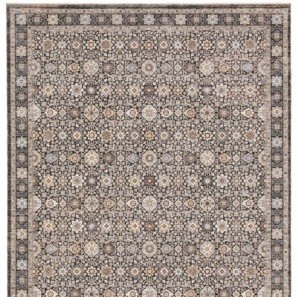 8' X 11' Charcoal Ivory and Beige Floral Power Loom Area Rug With Fringe