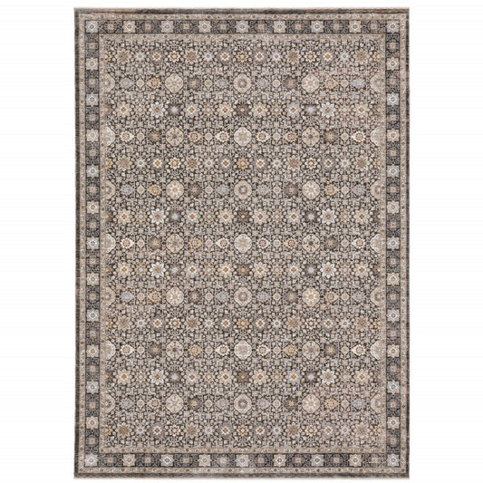 8' X 11' Charcoal Ivory and Beige Floral Power Loom Area Rug With Fringe